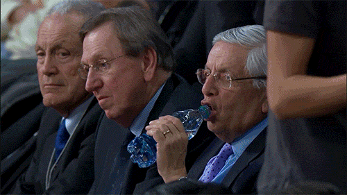 david-stern-chokes-on-water-during-nets-clippers-game.gif