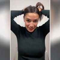 aoc_tying_hair_meme.jpg
